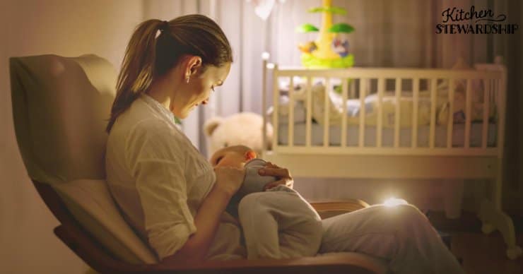 woman breastfeeding baby