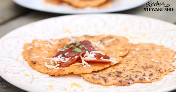 Keto tortillas on a plate with pepperoni and cheese made with the grain free keto tortillas recipe