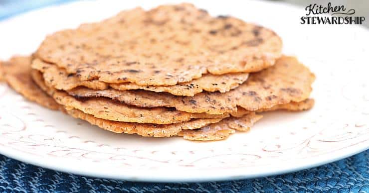 Grain-free keto tortillas stacked on a plate made with the homemade keto tortillas recipe