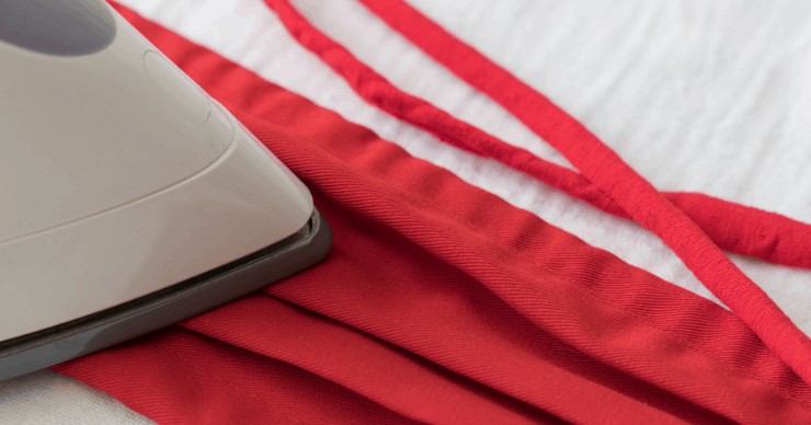 face mask being ironed