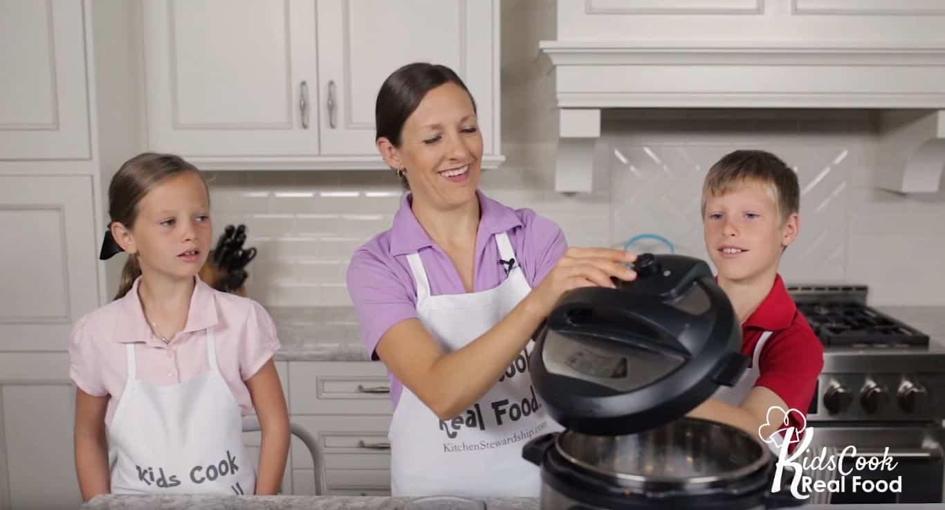 Katie Kimball teaching kids about Instant Pot lid