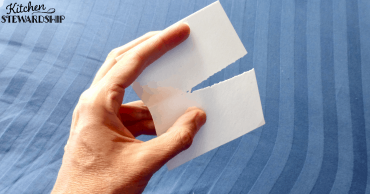 tearing a Tru Earth laundry strip