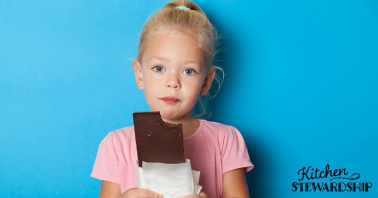 girl eating chocolate