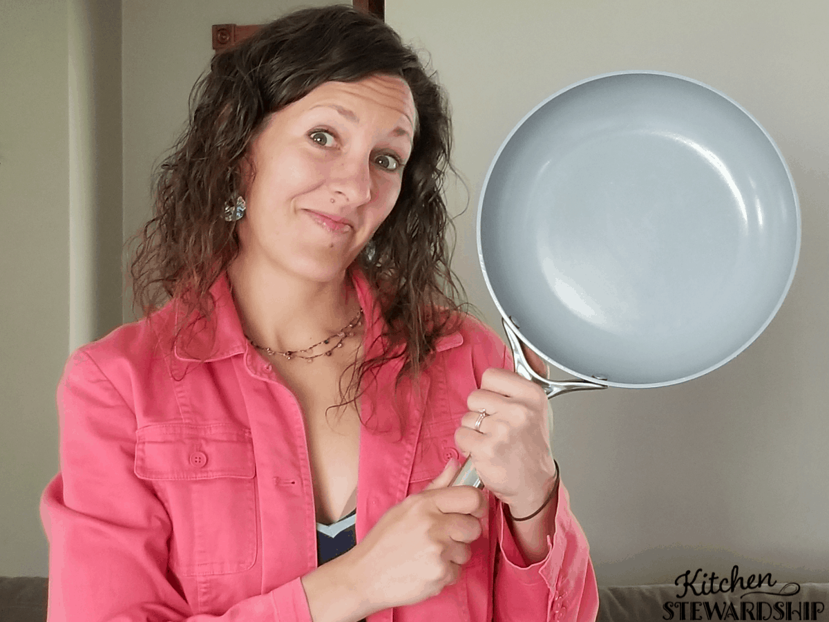 Katie holding a Caraway pan