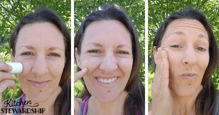 Katie applying sunscreen