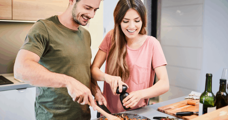 couple cooking dinner