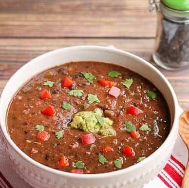 Whether you're trying to get your kids to eat more veggies or you're hosting a holiday party, this black bean soup will be a hit.