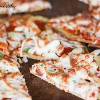 Chickpea Flour Crust Pizza Recipe on the Stovetop (Grain-Free, High-Protein) :: via Kitchen Stewardship