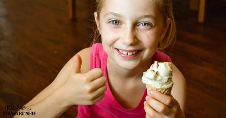 girl holding dairy-free ice cream