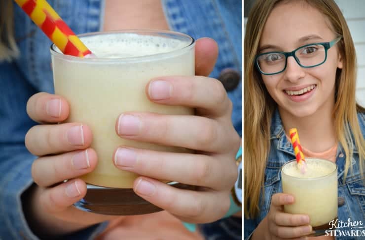 girl holding orange creamsicle smoothie