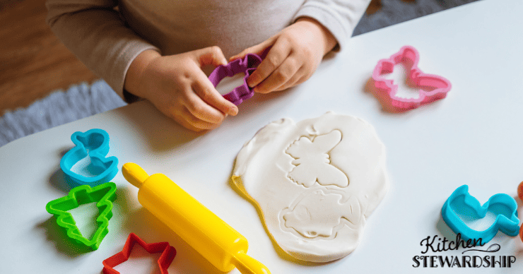 girl playing with playdough