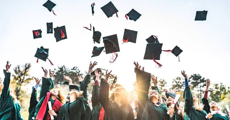 graduates throwing hats