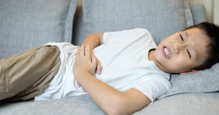 kid with stomach ache