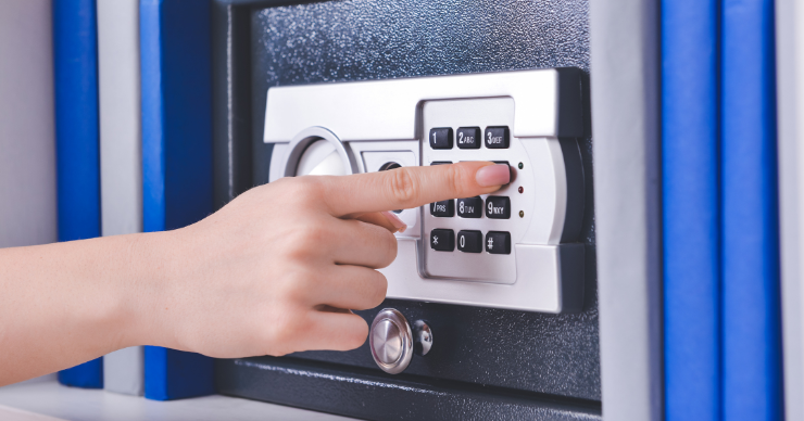 woman unlocking a safe
