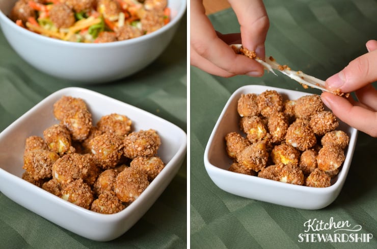 stretching cheesy mozzarella balls